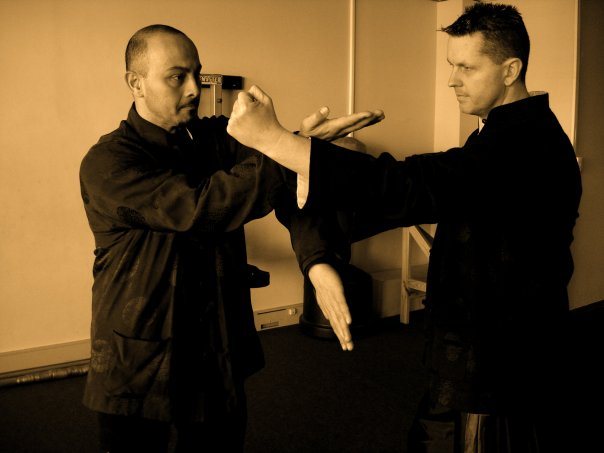 Joe Sayah and Mark Blackwell practising a Wing Chun partner technique
